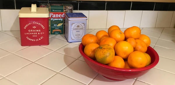 Bowl of tangerines on kitchen counter