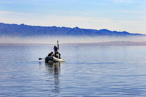 3 people on a boat in the Salton Sea