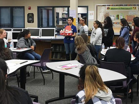 SISTERS, student giving a presentation