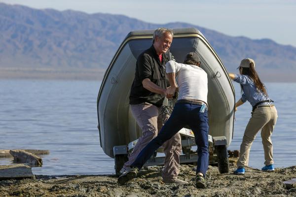 launching a skiff into the Salton Sea